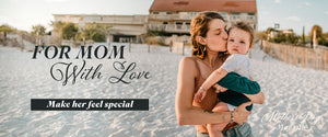 Mom and son on beach in an intimate moment. Make her feel special