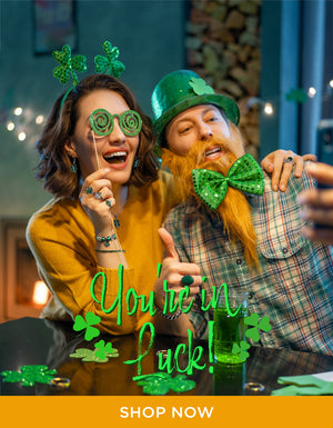 St Patrick Day Jewelry Collection with couple wearing festive outfits